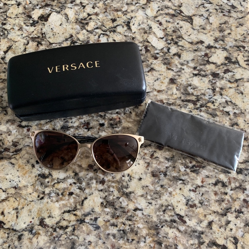 Versace gold sunglasses. Polarized